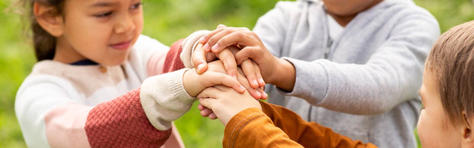 Kids in a circle holding hands