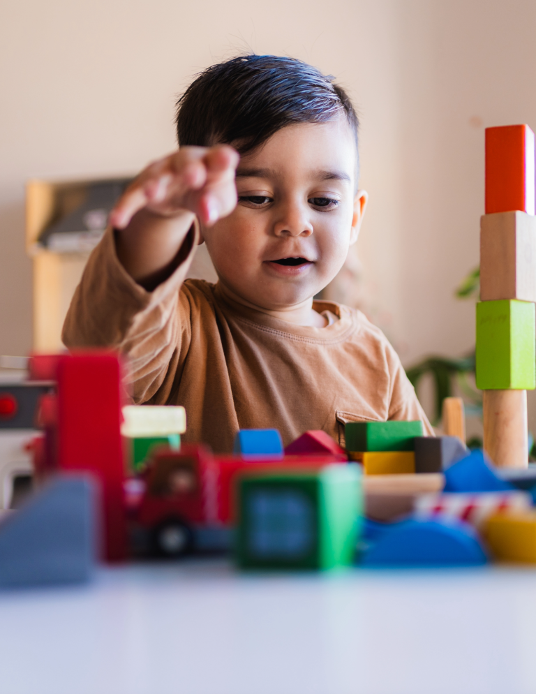 Young boy playing with blocks